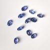 Die aus der Zoisit-Gruppe stammenden ovalen blau/violetten Tansanite wurden in Modernen Brilliantschliff in den 70er Jahren geschliffen.